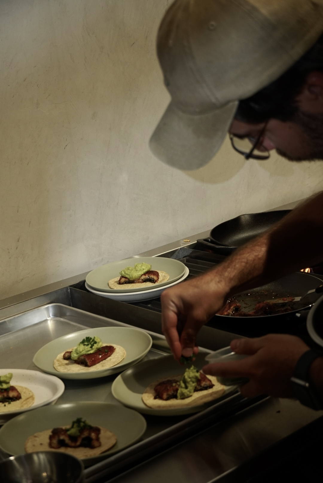 Chef plating a hospitality experience