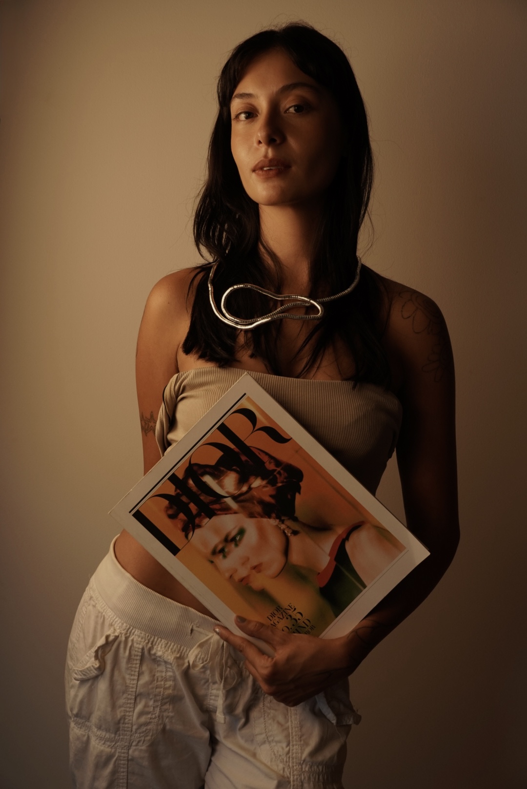 Editorial jewelry portrait with magazine